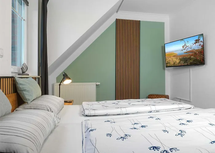 Дом отдыха Doppelhaeuser Timmendorf Haus Neptun